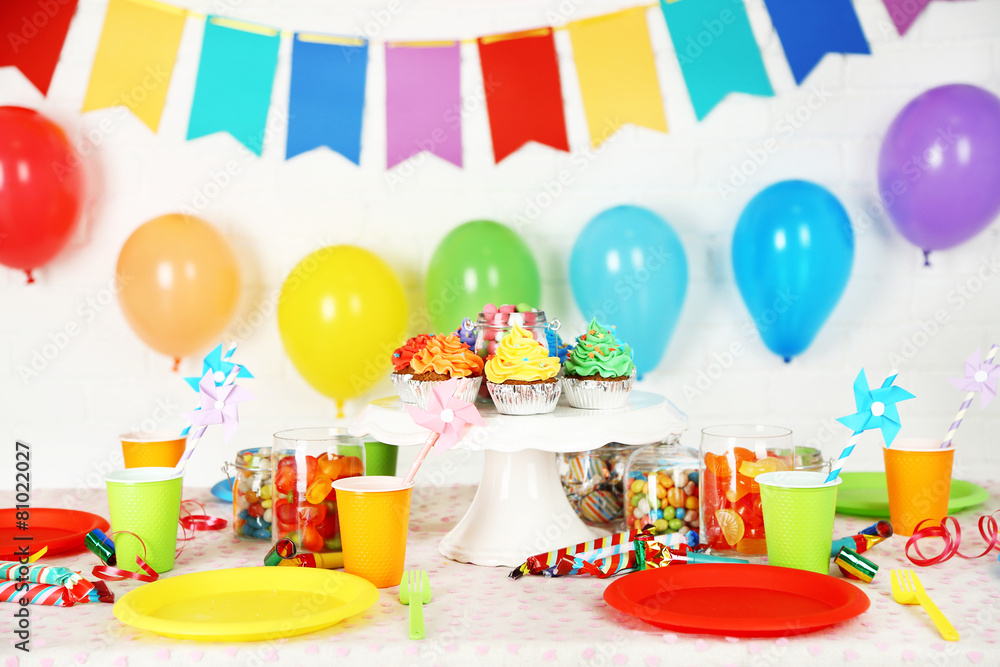 Prepared birthday table with sweets for children party
