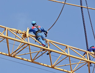 Wall Mural - Workers on the crane