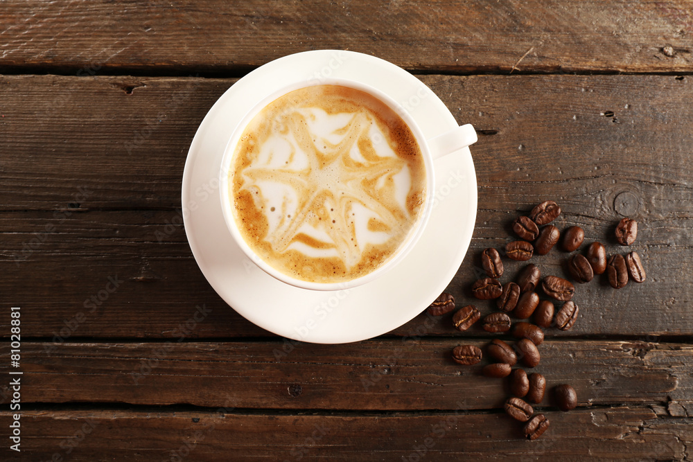 Cup of coffee latte art on wooden background
