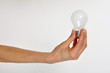 Electric bulb in hand