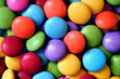 Macro detail of pile of colored smarties
