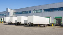 Distribution Centre With Trailers Waiting To Be Loaded