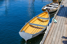 Rowboat Moored To A Wooden Jetty