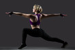 © fizkes - Lunge exercises with stretched arms