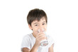 © wckiw - little asian boy drinks water from a glass