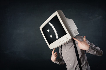 Funny young businessman with a monitor on his head and smiley on