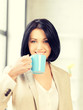 © Syda Productions - lovely businesswoman with mug