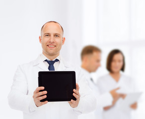 Poster - smiling male doctor with tablet pc