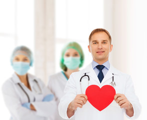 Sticker - smiling male doctor with red heart and stethoscope