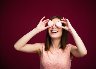 Poster - Happy woman closing her eyes with round cookies