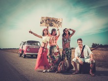 Multinational Hippie Hitchhikers On A Road
