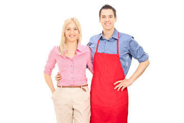 Poster - Man with a red apron posing with his blond girlfriend