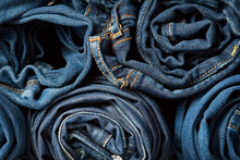Stack Of Blue Jeans As A Background Or Texture