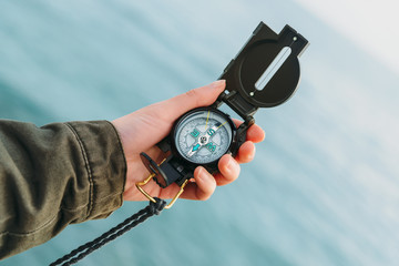 Sticker - Hiker searching direction with a compass