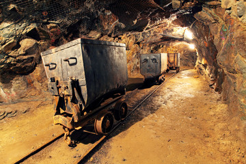 Wall Mural - Mining cart in silver, gold, copper mine
