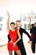 © Africa Studio - Beautiful couple in active ballroom dance, indoors