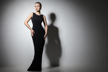 Beautiful Woman Model Posing In Elegant Black Dress