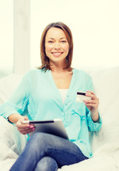 Canvas Print - smiling woman with tablet pc computer at home