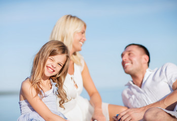 Poster - happy family having a picnic