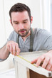 © Production Perig - Young attractive carpenter working in his workshop