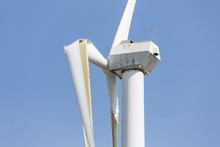 Wind Turbine With Broken Wings After A Storm