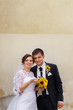 © syrotkin - Portrait Of Bridal Couple Outdoors