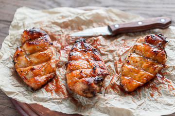 Wall Mural - Grilled chicken breasts in hot mango sauce