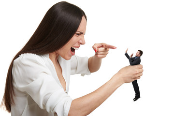 Wall Mural - yelling woman pointing at small scared man