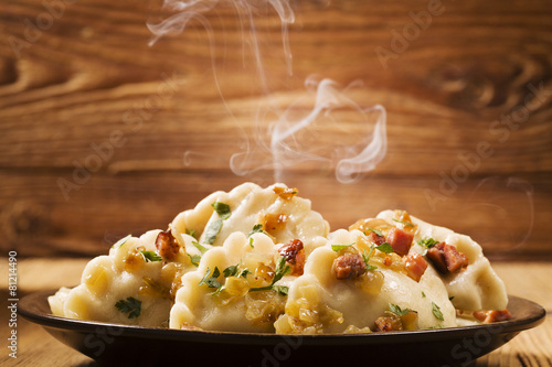 Fototapeta do kuchni Delicious homemade dumplings with onion and bacon