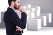 © WavebreakMediaMicro - thinking businessman standing with hand on chin