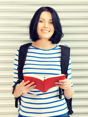 Canvas Print - woman with bag and book