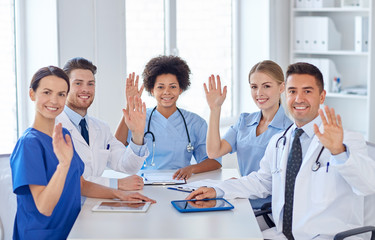 Canvas Print - group of happy doctors meeting at hospital office