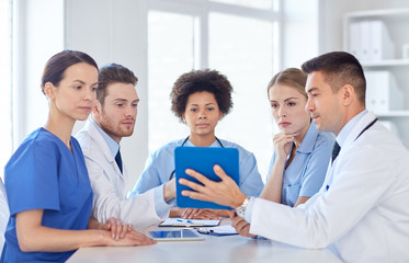 Canvas Print - group of happy doctors meeting at hospital office