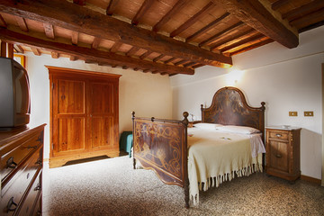 Wall Mural - Bedroom with rustic wooden bed