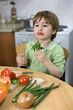 © likstudio - Adorable Little Boy Making Funny Face While Eating Parsley