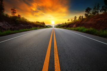 beautiful sun rising sky with asphalt highways road in rural sce