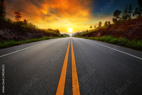 Cuadros en Lienzo beautiful sun rising sky with asphalt highways road in rural sce