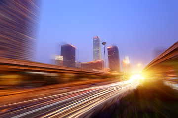 Wall Mural - the light trails on the modern building background in shanghai china