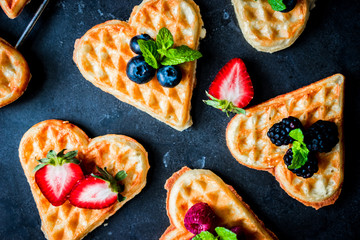 Wall Mural - Heart waffles with berries