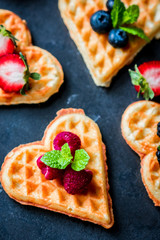 Wall Mural - Heart waffles with berries