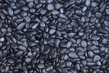 Background Texture Of Waterworn Black Pebbles