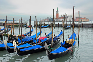 Wall Mural - Venice, Italy, gondola parking at sun set.