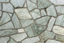 Section Of Flagstone Wall With Varying Shapes And Lines