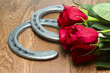 Kentucky Derby Red Roses with Horseshoes on Wood