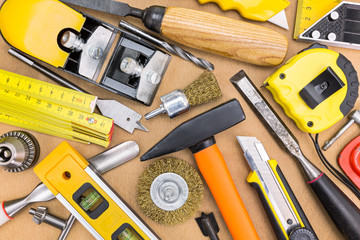 Sticker - Assorted work tools on wooden background