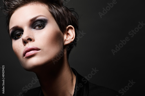 Fototapeta na wymiar Fashion brunette woman with short hair cut