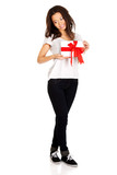 Fototapeta Na drzwi - Attractive woman with gift box.
