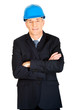 © Piotr Marcinski - Confident businessman with a helmet