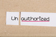 Sign with word unauthorized turned into authorized