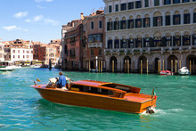 A Specific Water Taxi On The Grand Canal In Venice. The Canals S
